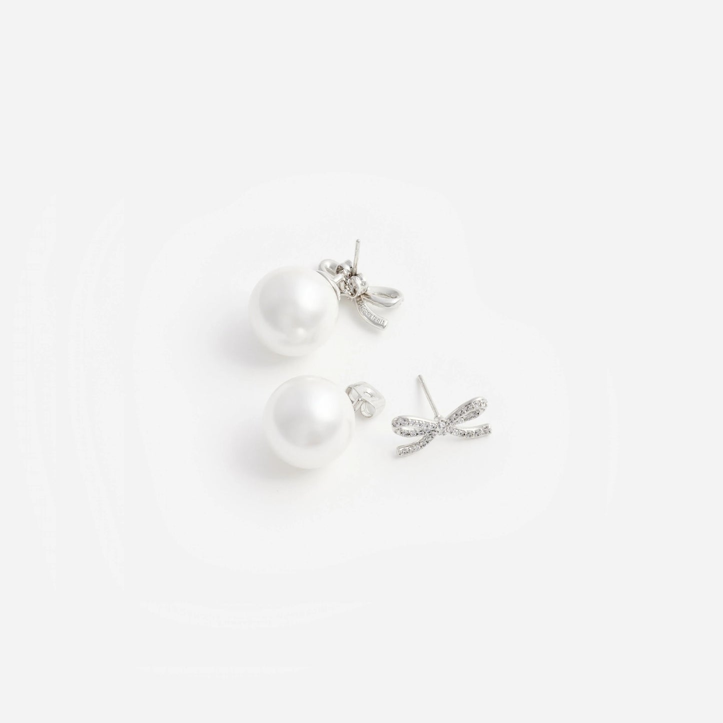 Crystal Bow Pearl Back Earrings